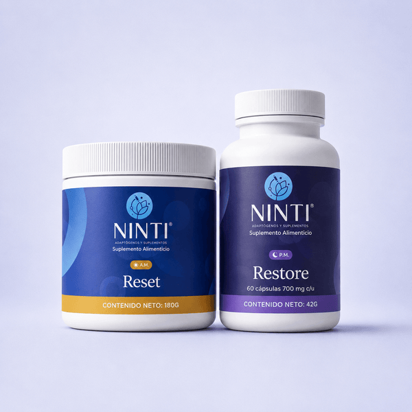 Suplementos NINTI: Reset (A.M.) y Restore (P.M.) en envases azul y blanco sobre fondo lila.